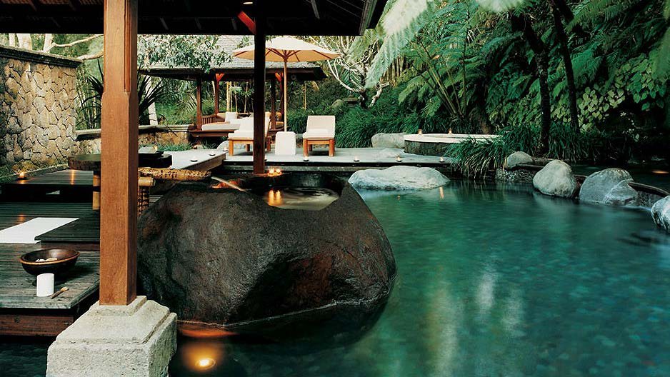 Natural rock pool inside a planted courtyard