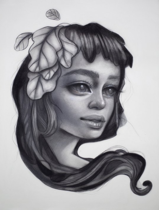 Graphite drawing of a woman with flowing hair