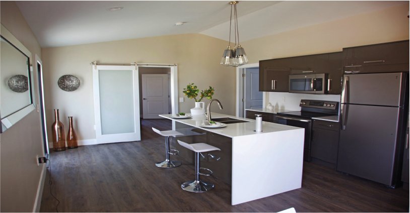 Open kitchen with island and pendant lighting