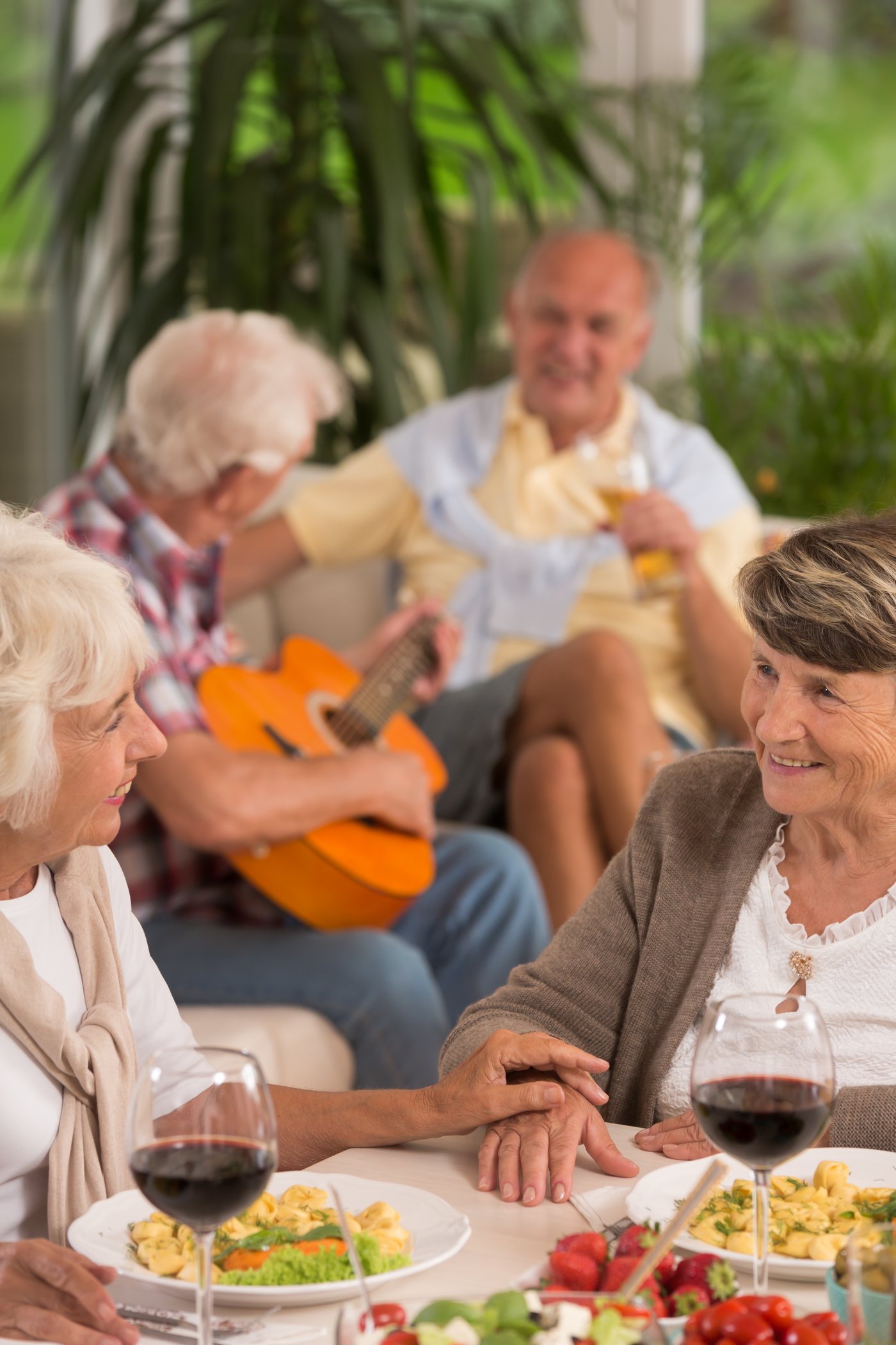 Residents sharing a meal outdoors